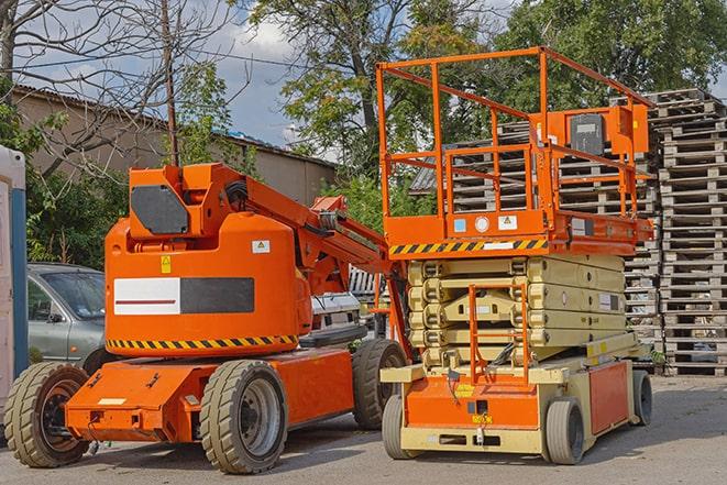 warehouse forklift lifting cargo onto shelves in Corcoran